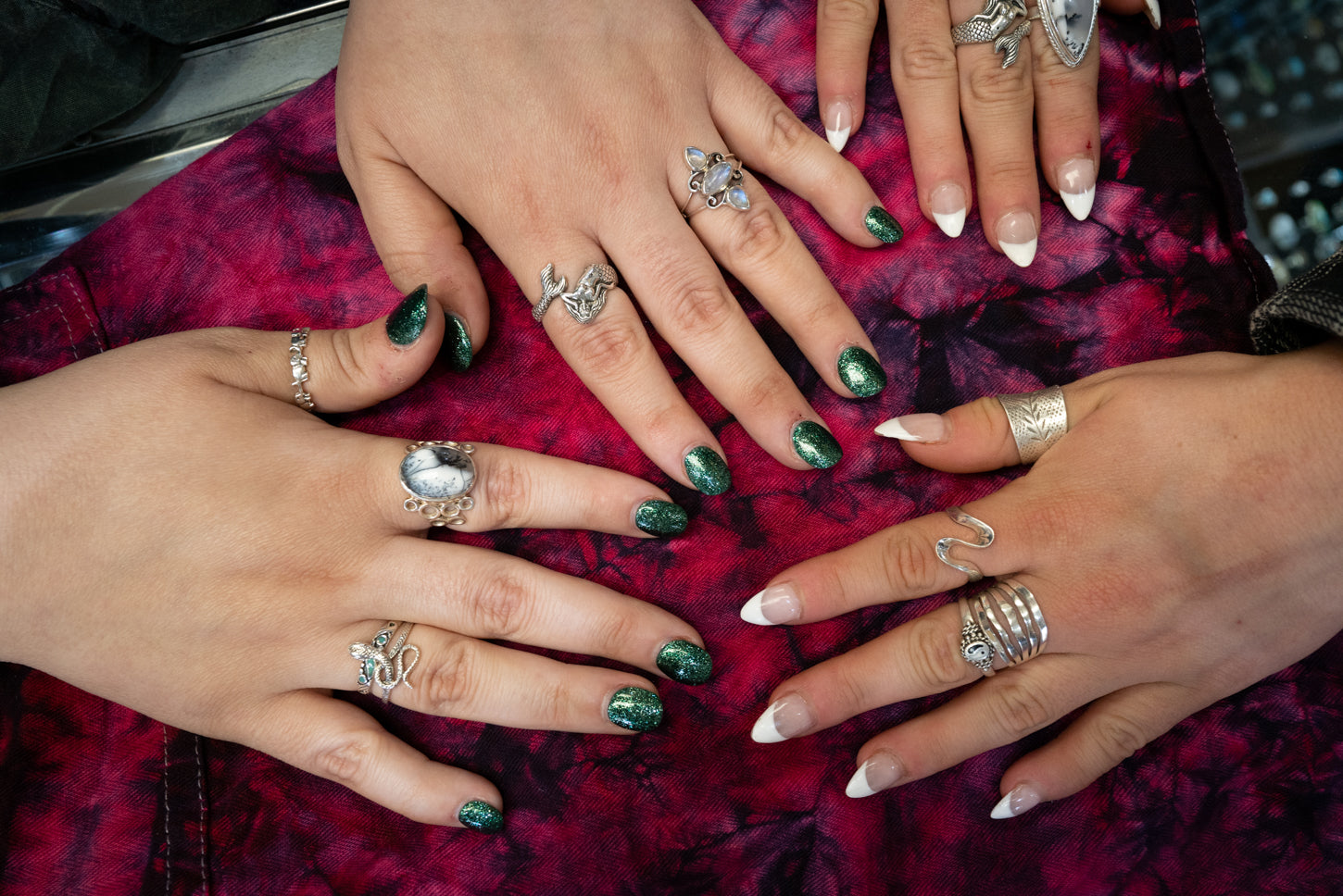 assorted rings on hands