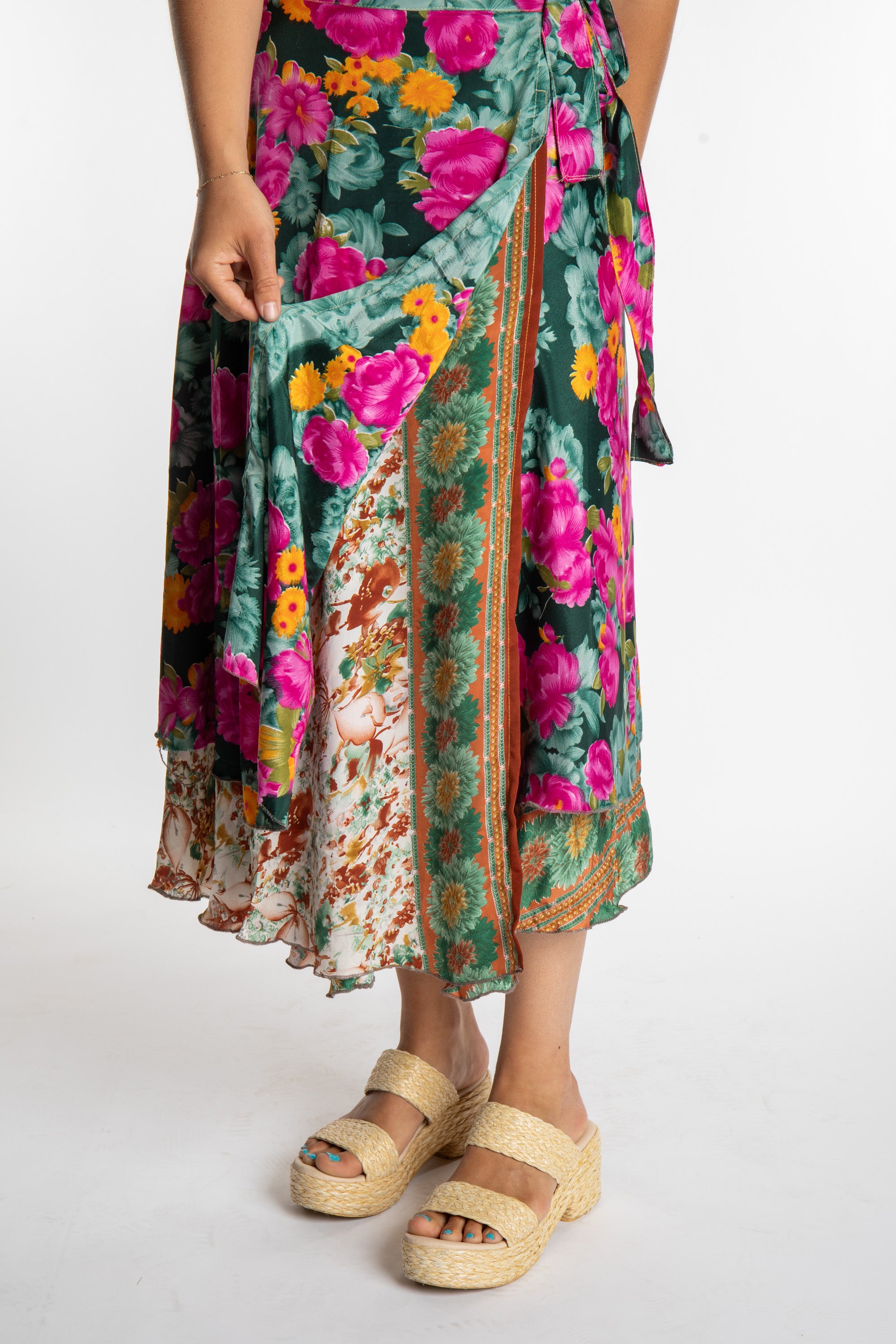 Sophie is wearing a long reversible silk wrap skirt in morning dew