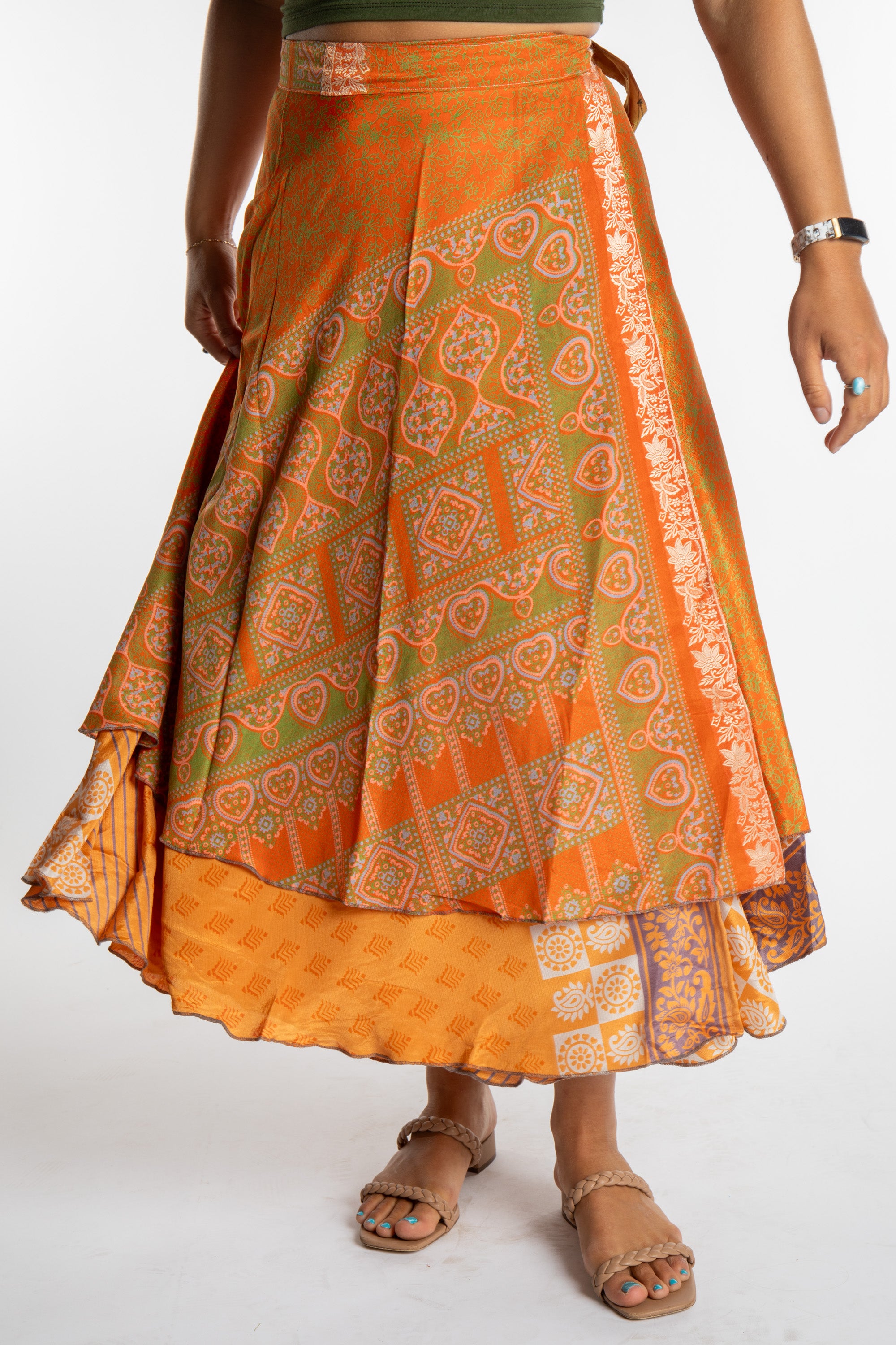 Sophie is wearing a long reversible silk wrap skirt in fire on the mountain