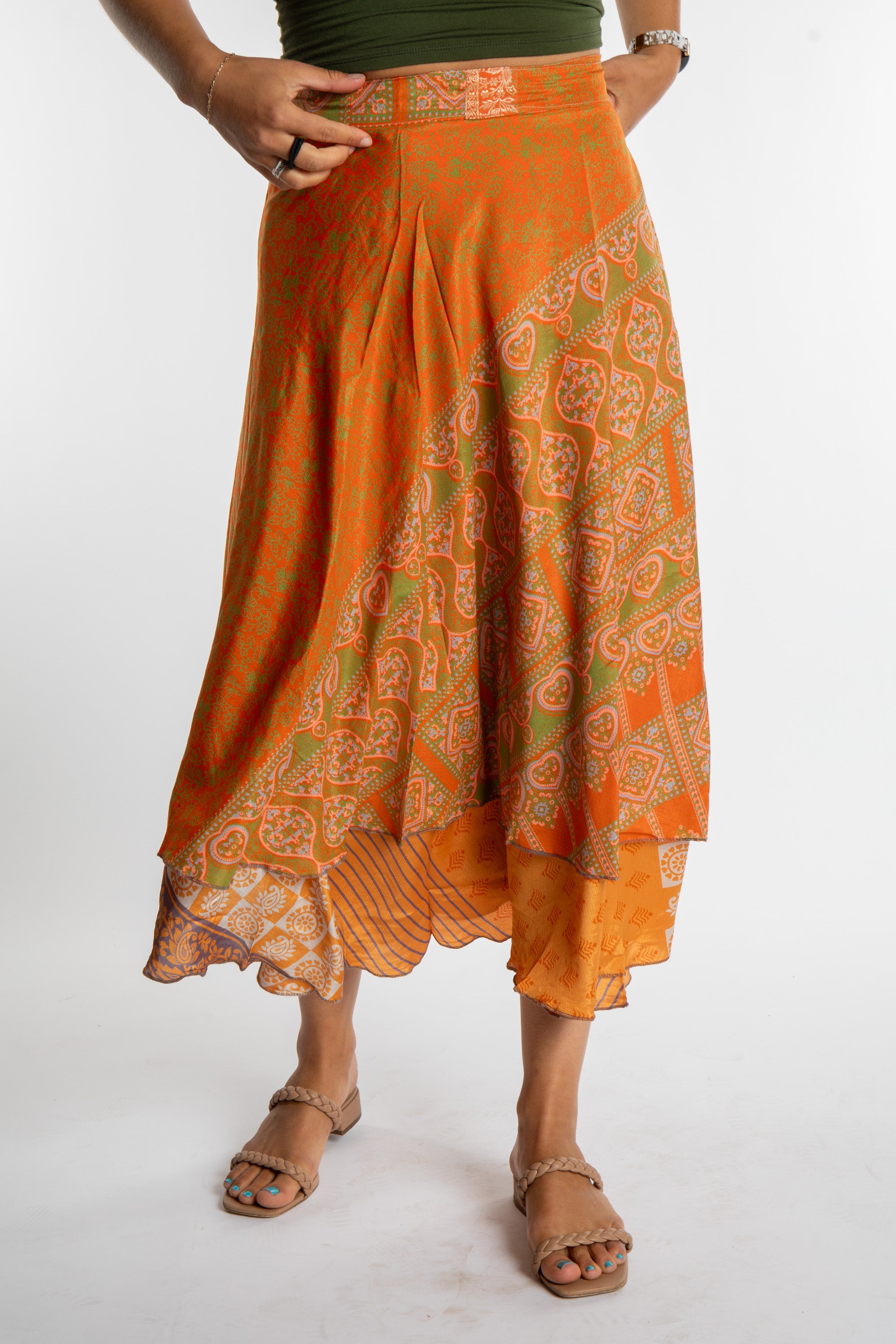 Sophie is wearing a long reversible silk wrap skirt in fire on the mountain