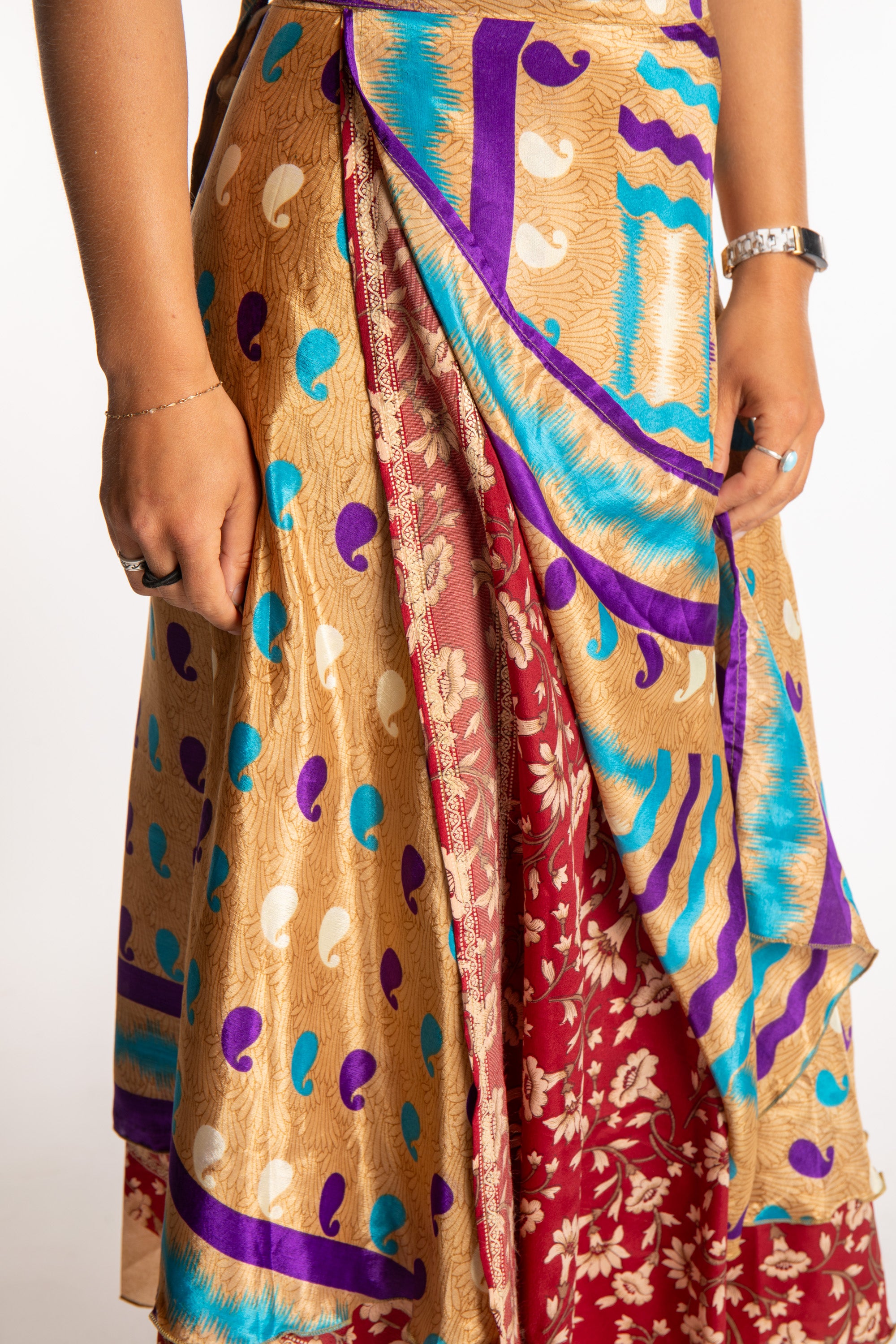 Sophie is wearing a long reversible silk wrap skirt in jack straw