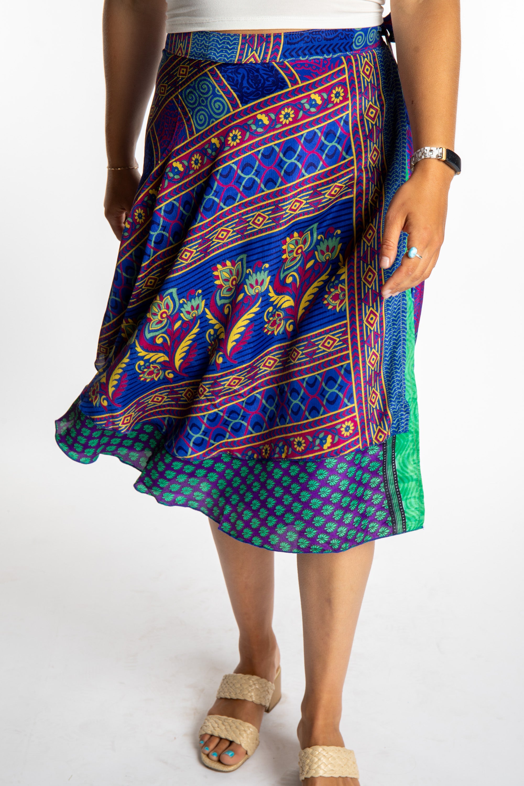 Sophie is wearing a midi reversible silk wrap skirt in dark star