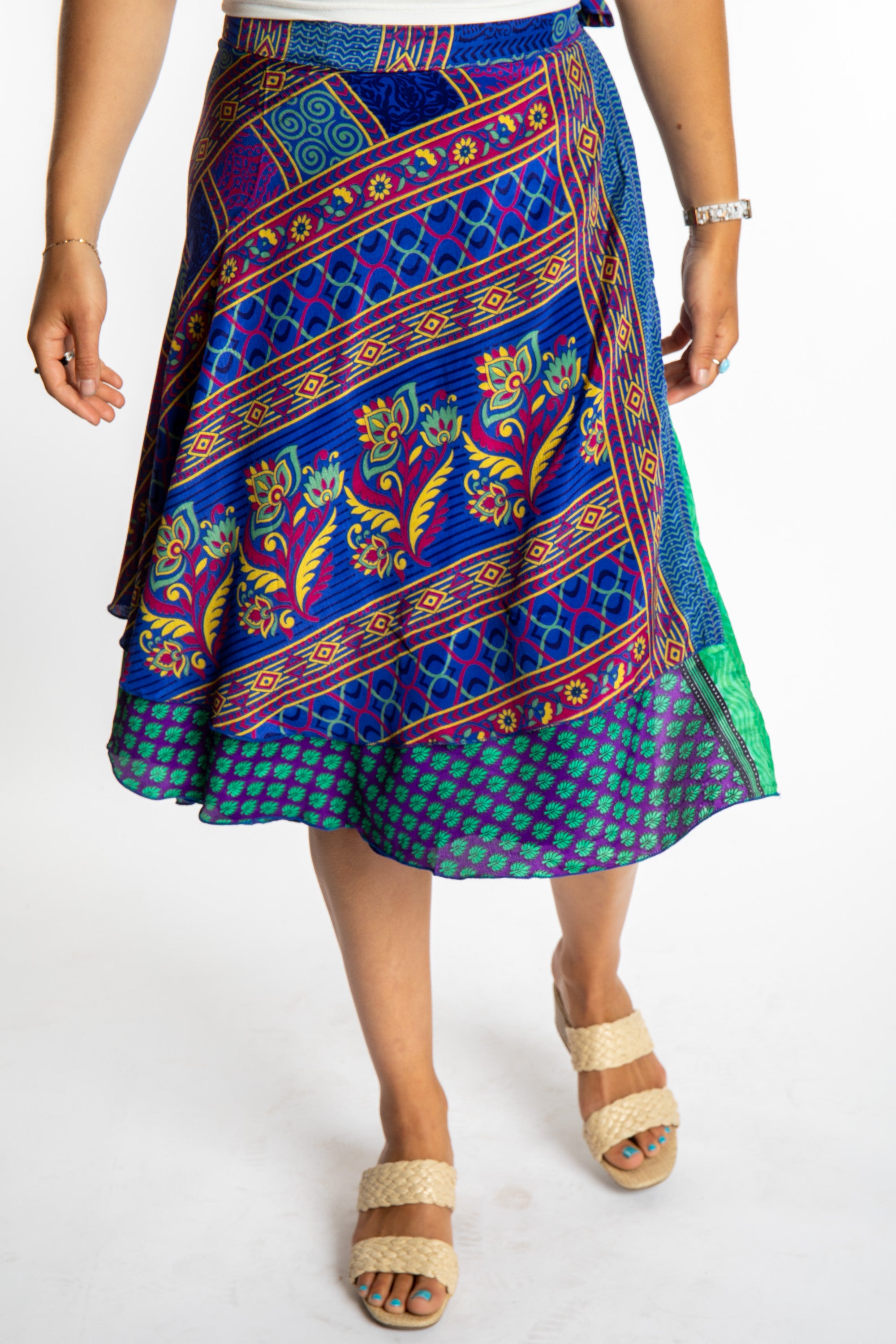 Sophie is wearing a midi reversible silk wrap skirt in dark star