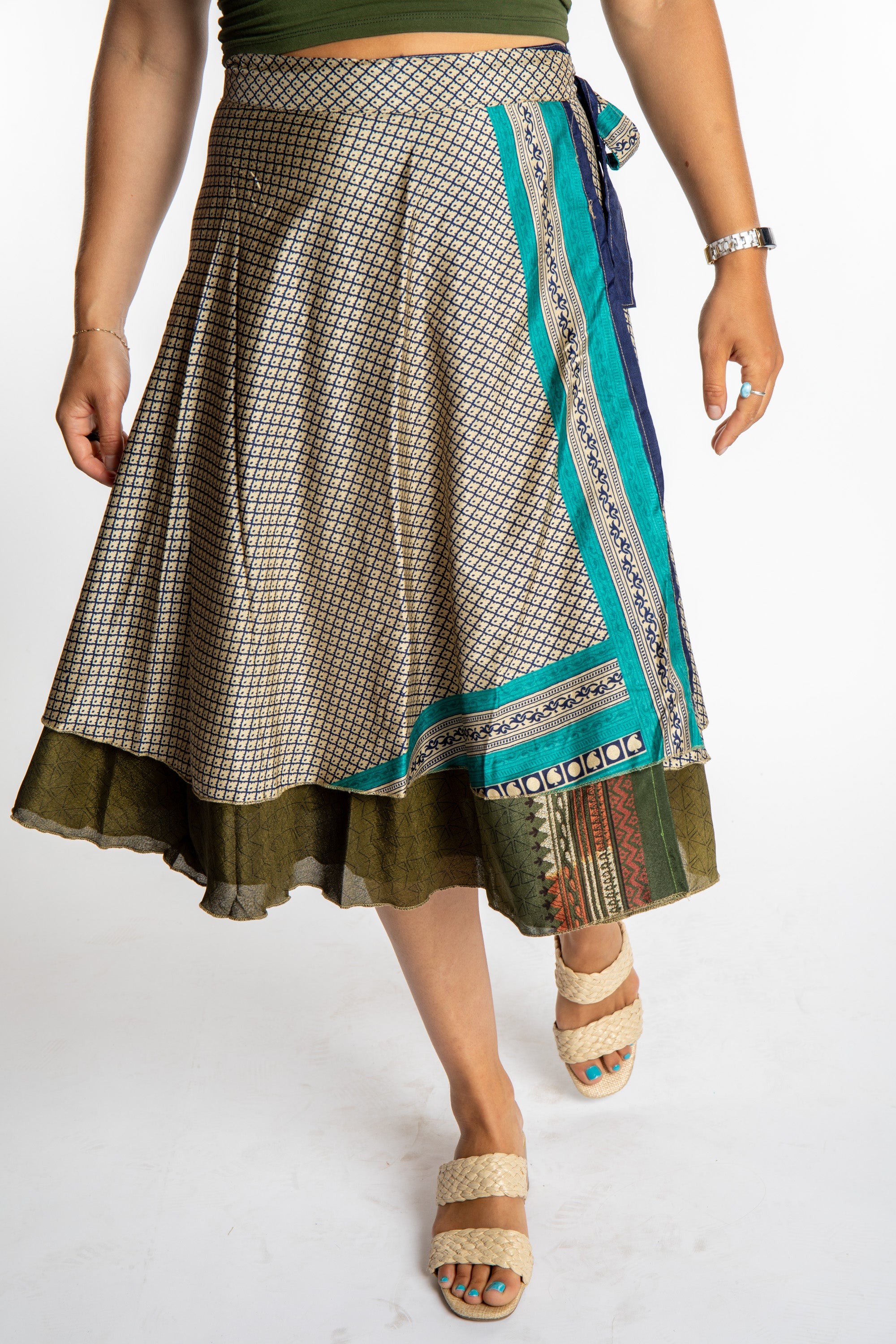 Sophie is wearing a midi reversible silk wrap skirt in shakedown street