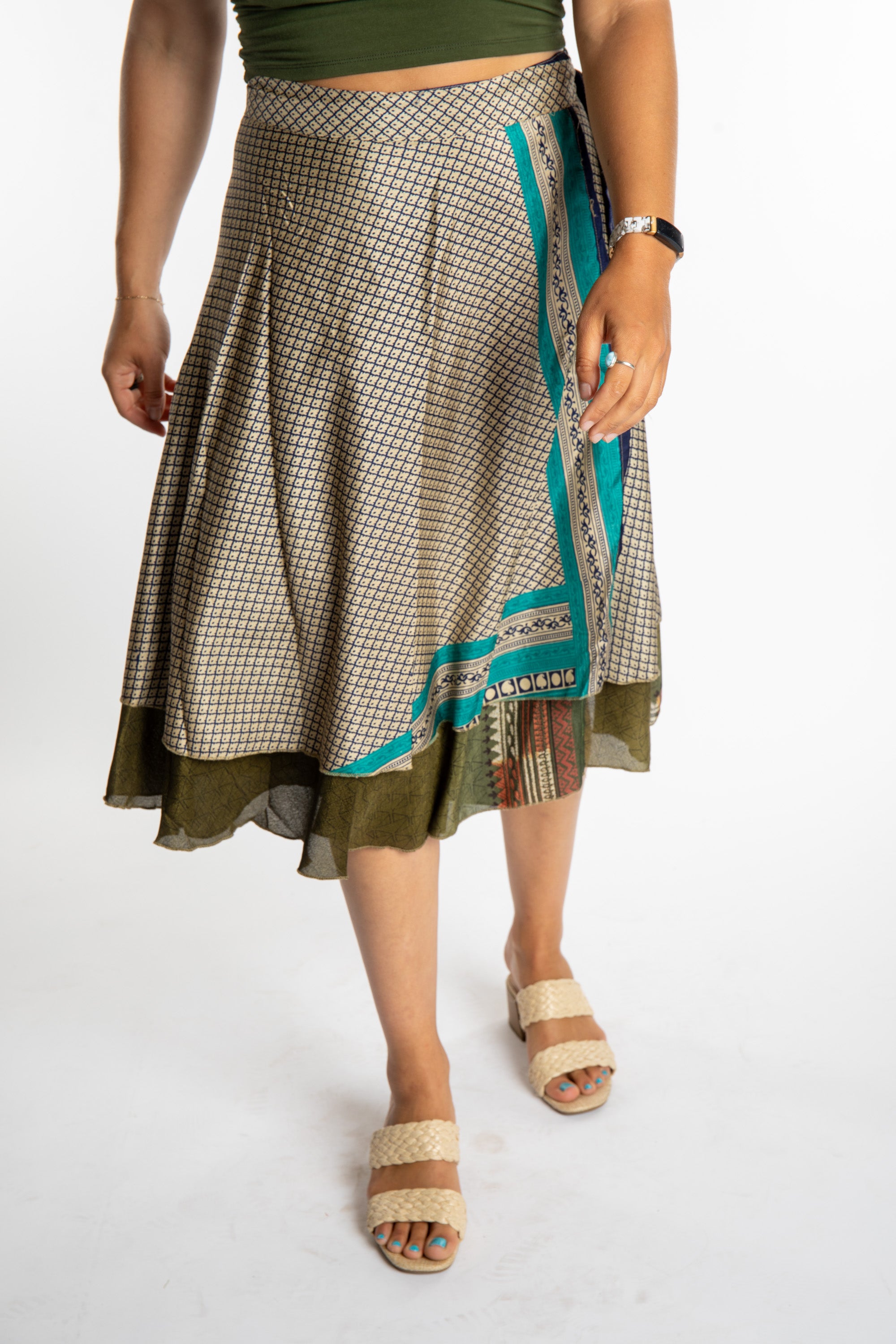 Sophie is wearing a midi reversible silk wrap skirt in shakedown street