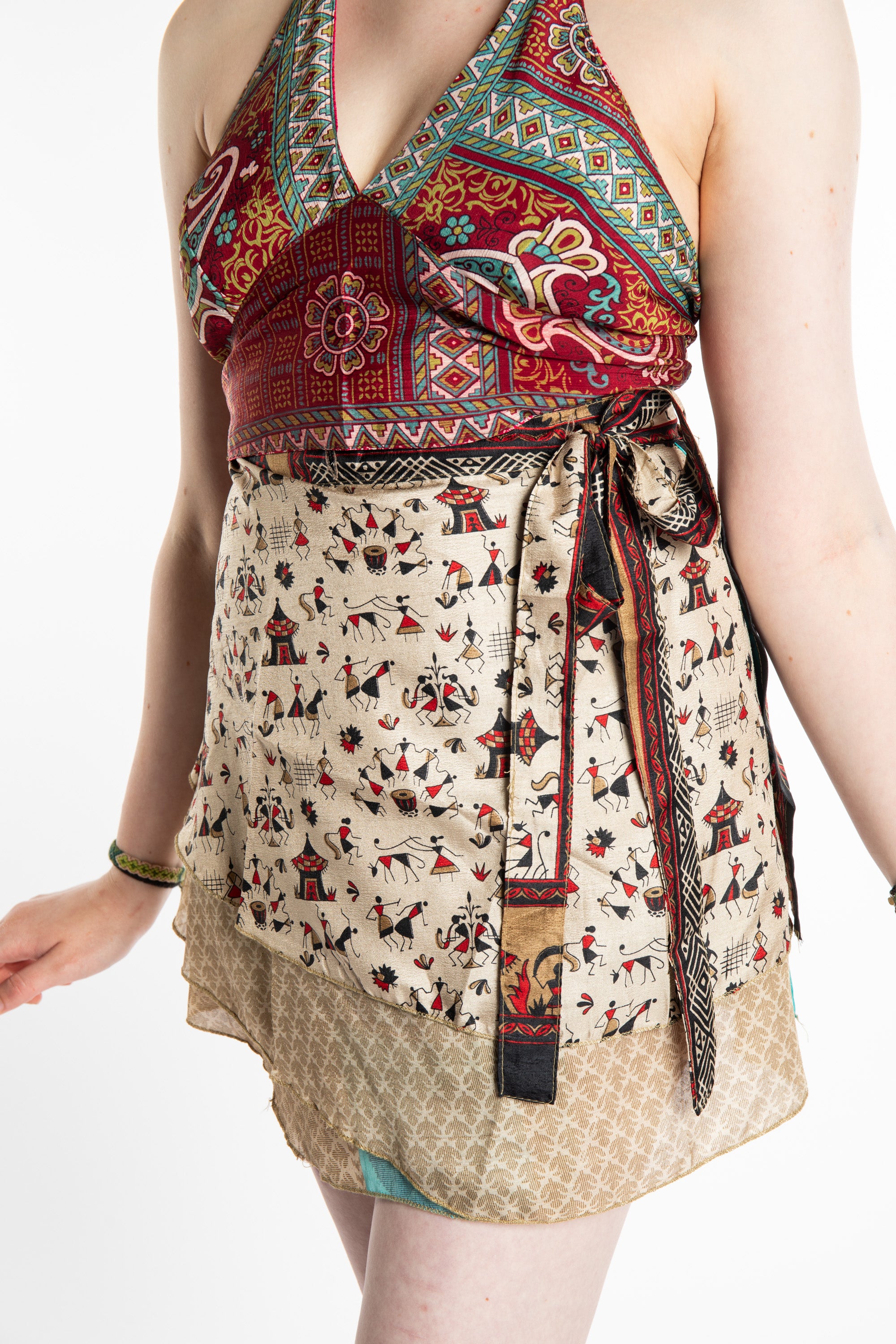 Honora is wearing a silk wrap skirt in Jack Straw
