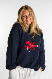 Sophie is wearing a size S Navy Lobster Sweater