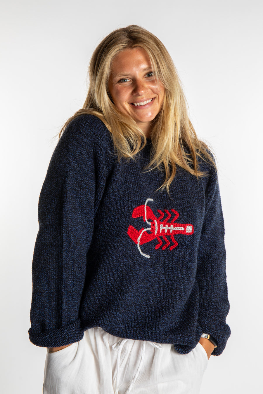 Sophie is wearing a size S Navy Lobster Sweater