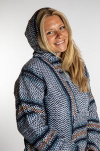 Sophie is wearing a small artesia recycled baja hoodie