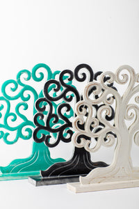 Wooden tree of life sculpture in turquoise, black, and white