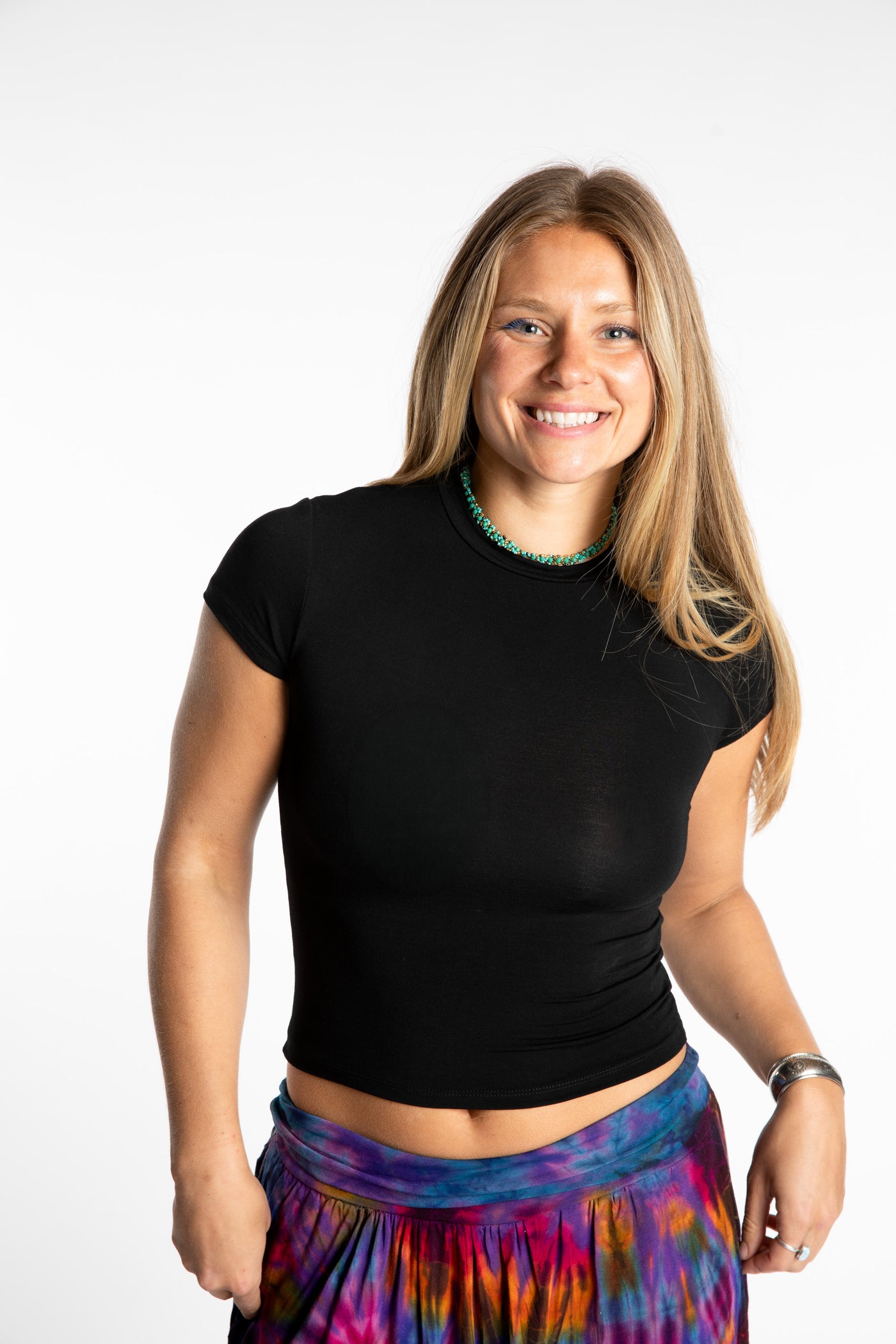 Sophie is wearing the S/M Black Chara Crew Neck Top