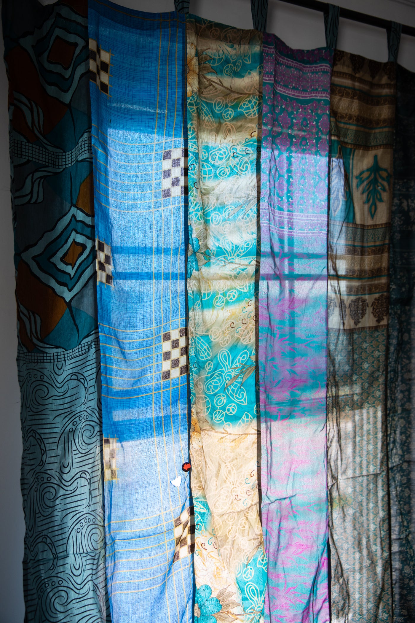 Recycled silk sari curtains in morning dew