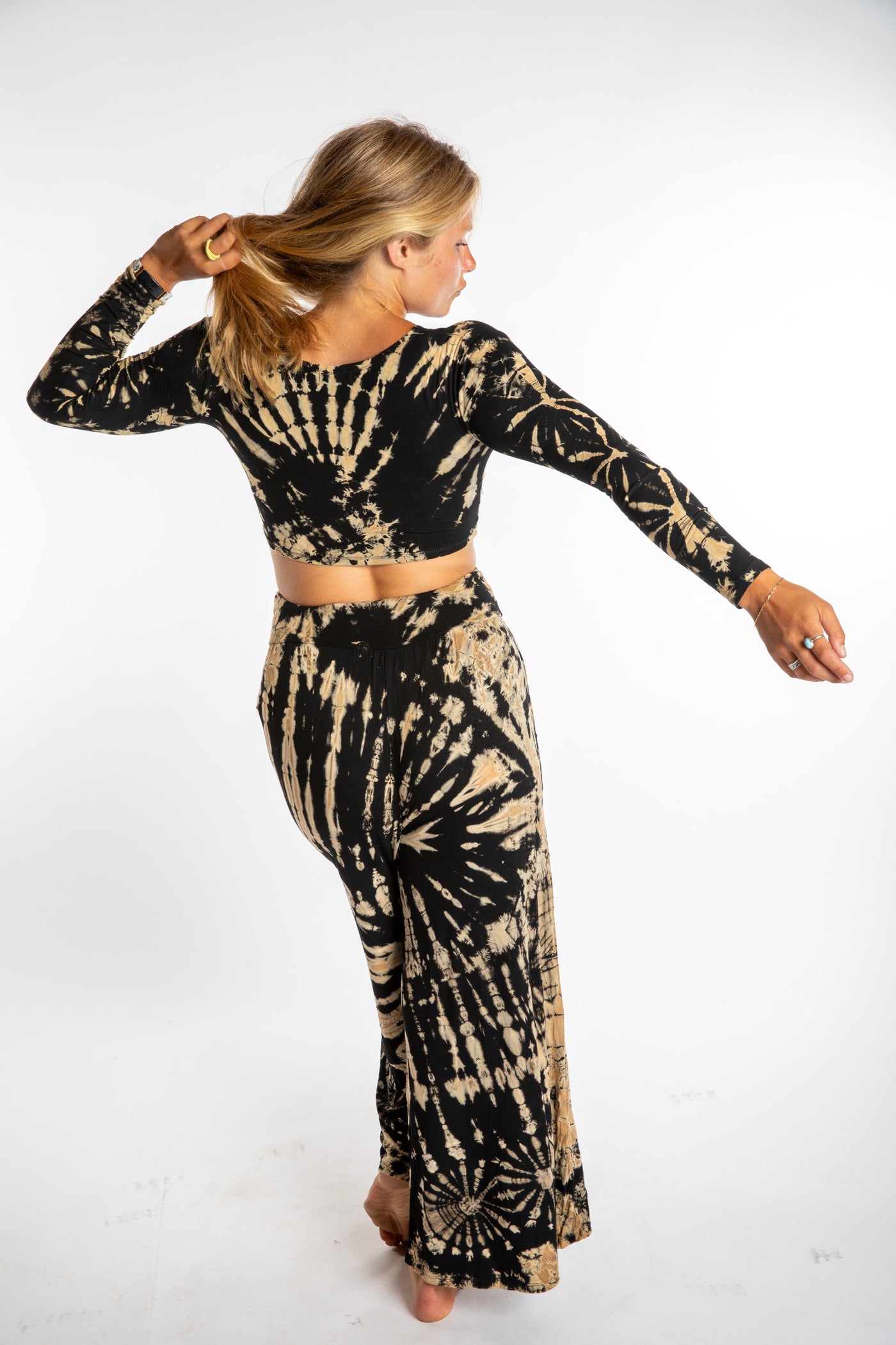 Sophie wearing the s/m tie dye crop top and tie dye wide leg pants in black and white