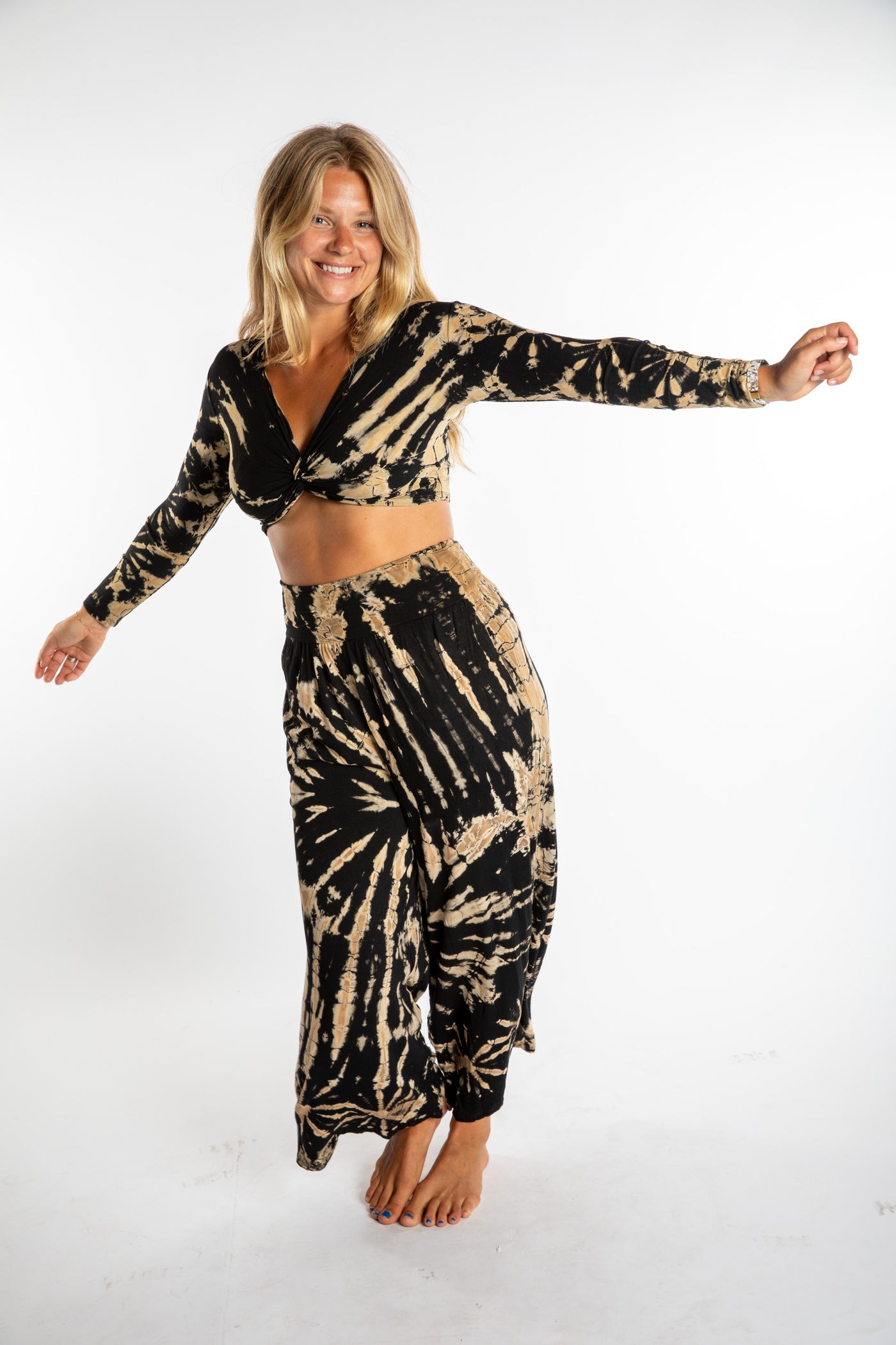 Sophie wearing the s/m tie dye crop top and tie dye wide leg pants in black and white