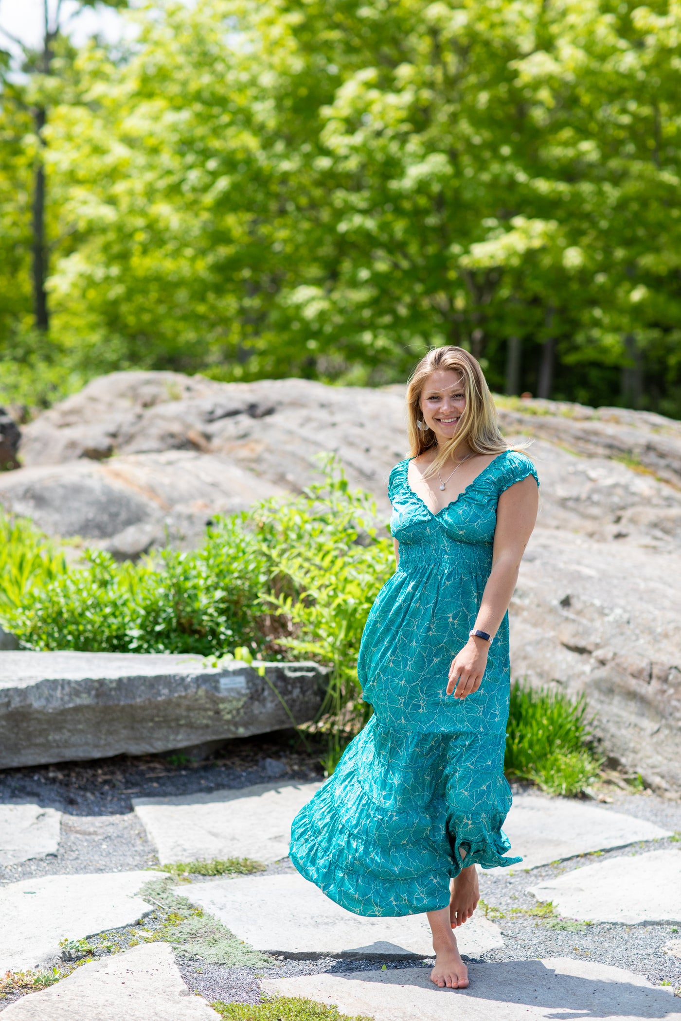 Woman walking in silky patterned dress