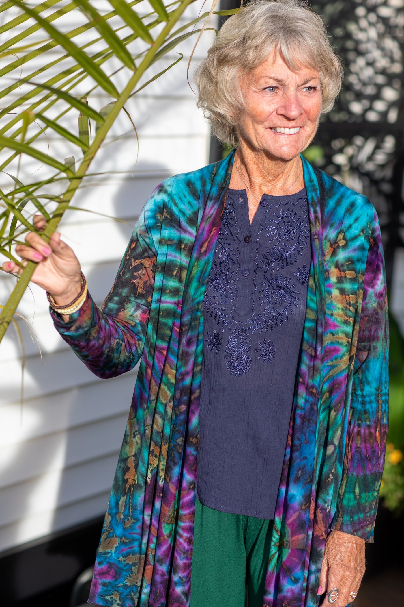 Penny wearing the ocean mudmee tie dye cardigan and navy kurta top