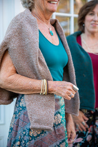 Penny wearing the S hooded alpaca sweater in Tan 