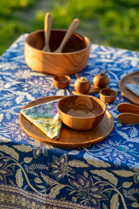 teak wooden decor on a block print tapestry