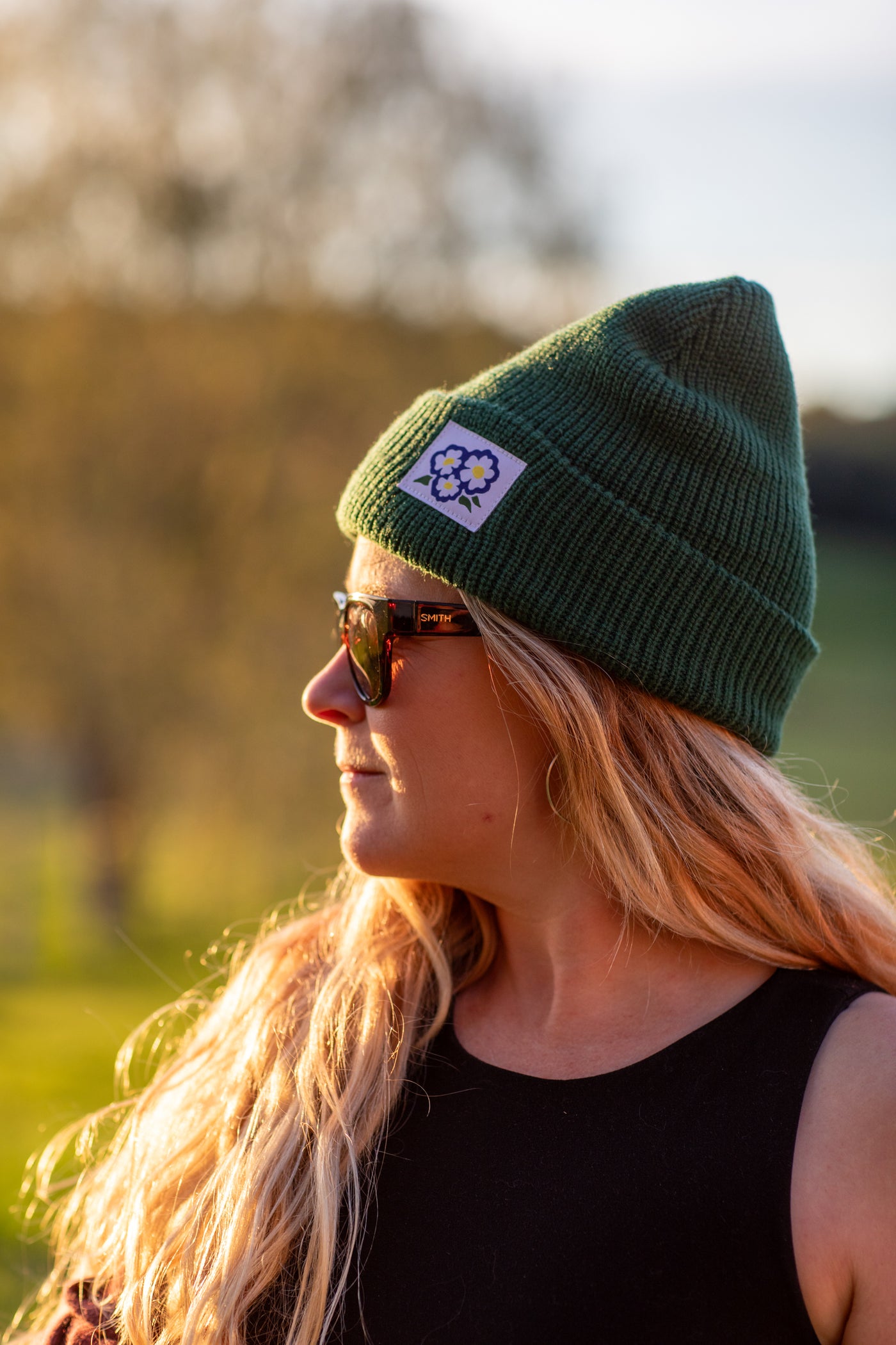 Holly wearing the Forest Green beanie hat