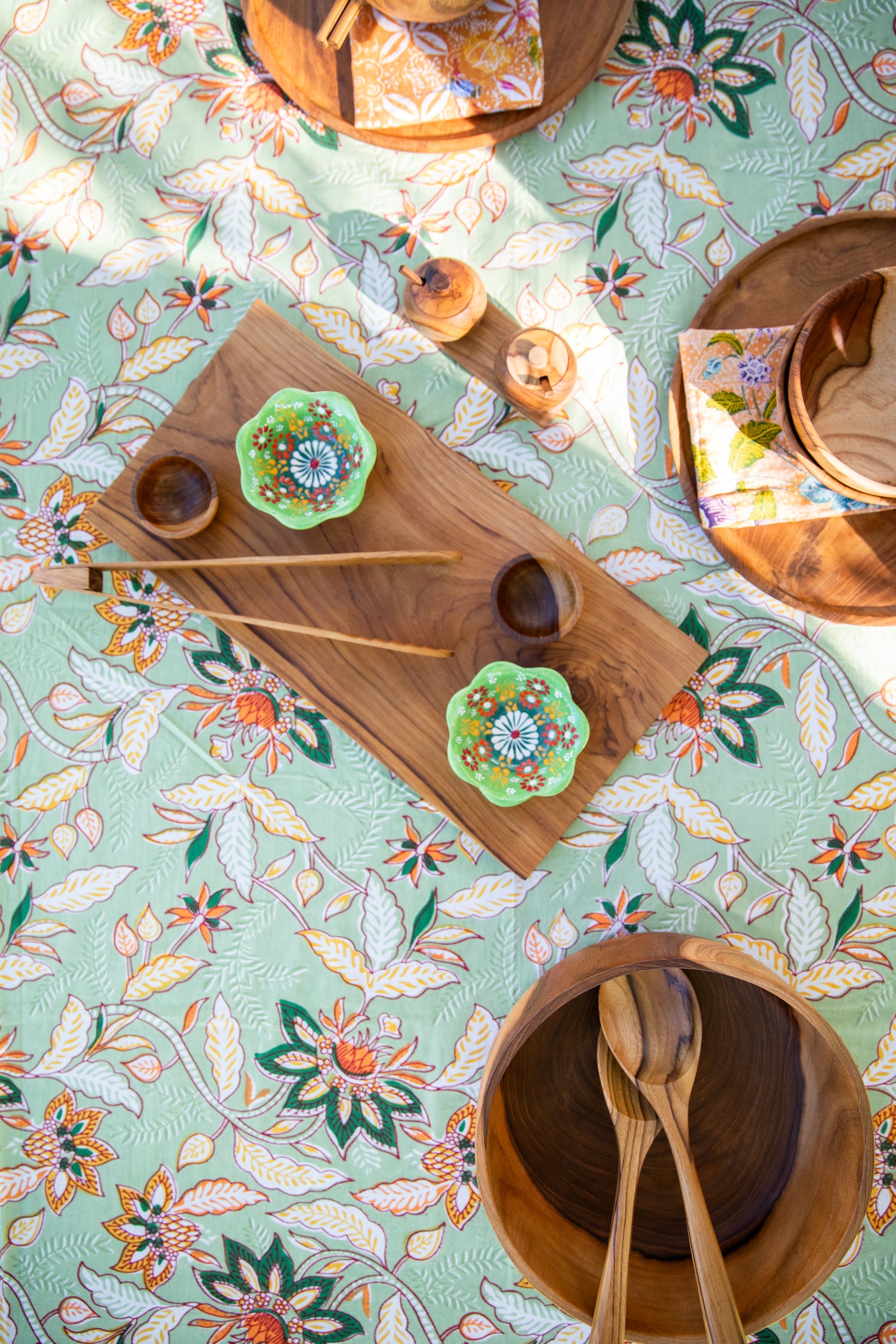 Wooden Teak table decor on a block print tablecloth