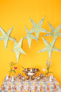 boho star decoration pack in yellow on white background during birthday party