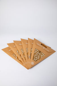 boho star decoration pack in gold on white background