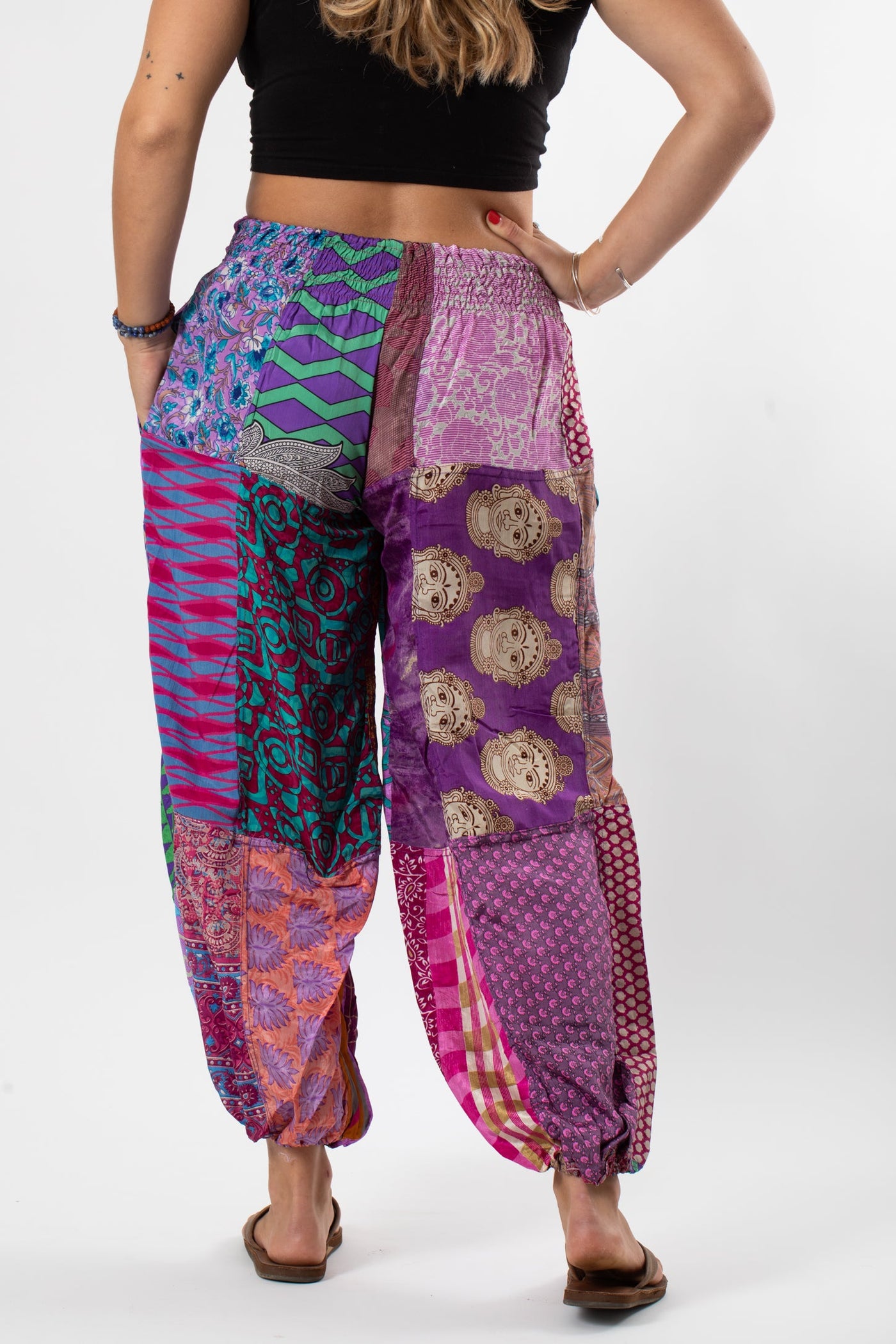 Sophie is wearing size S/M silk patchwork harem pants in dark star
