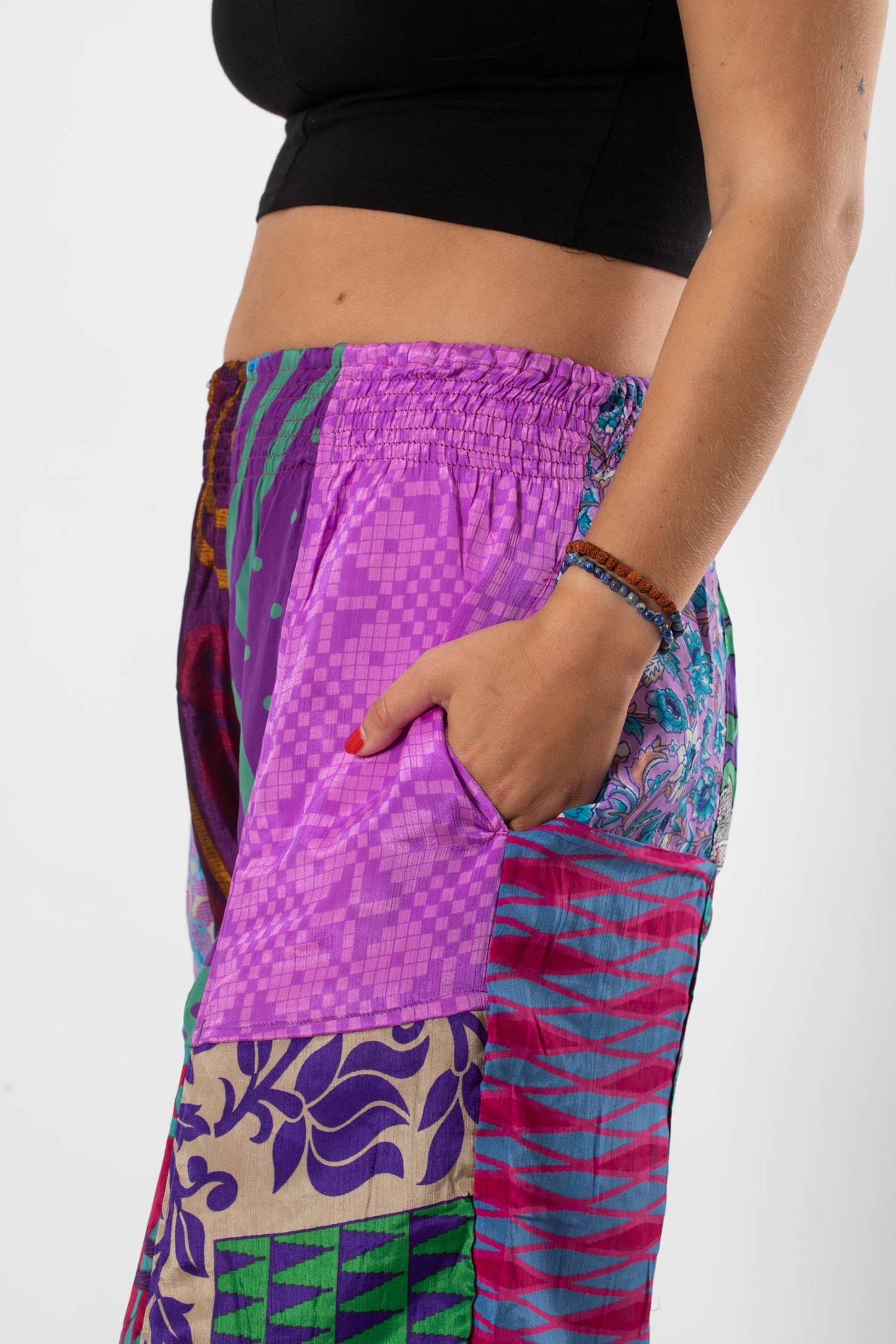 Sophie is wearing size S/M silk patchwork harem pants in dark star