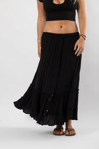 Sophie is wearing the Breezy Bliss Boho Prairie Skirt in black