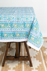 Bohemian block print tapestry in Blue Posie, displayed as a tablecloth