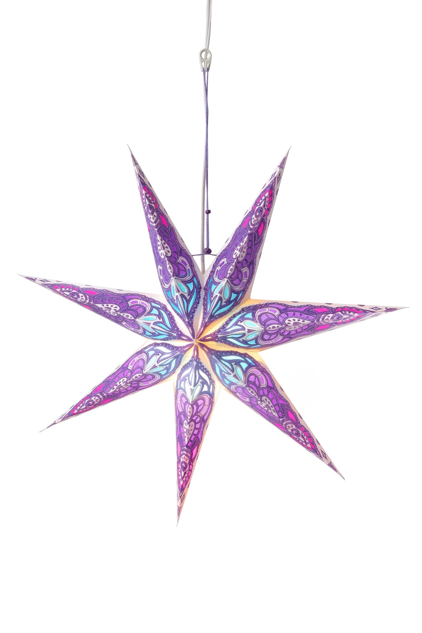 A purple patterned paper star lantern with a white backdrop. 