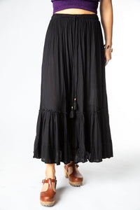 Sophie is wearing the Breezy Bliss Boho Prairie Skirt in black
