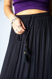 Sophie is wearing the Breezy Bliss Boho Prairie Skirt in black