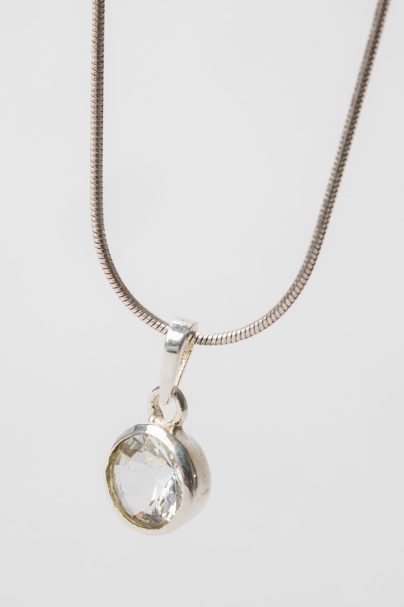 clear quartz crystal pendant in sterling silver necklace