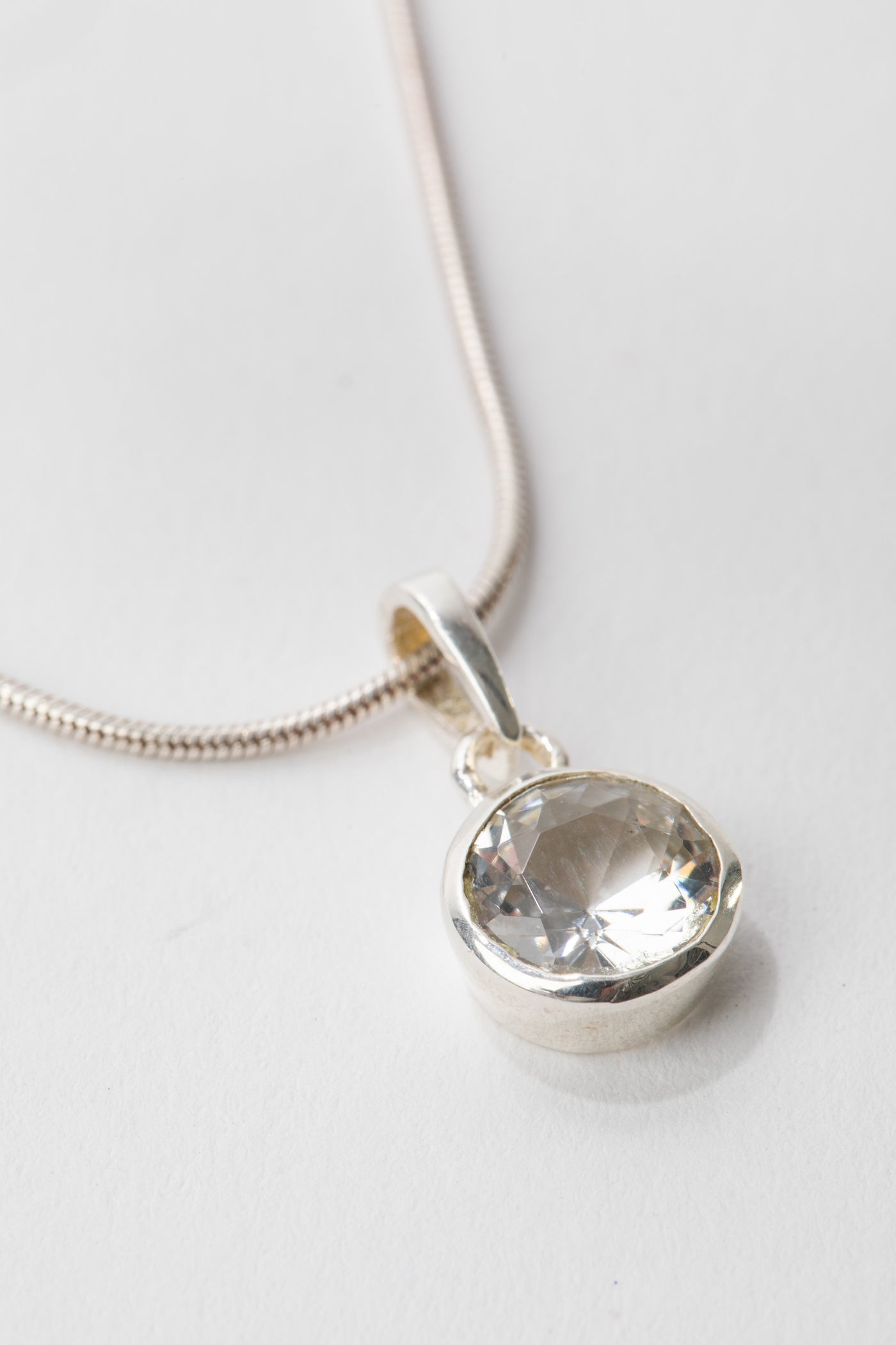 clear quartz crystal pendant in sterling silver necklace