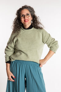 Susan is wearing a medium Classic Alpaca Wool Sweater in Celery