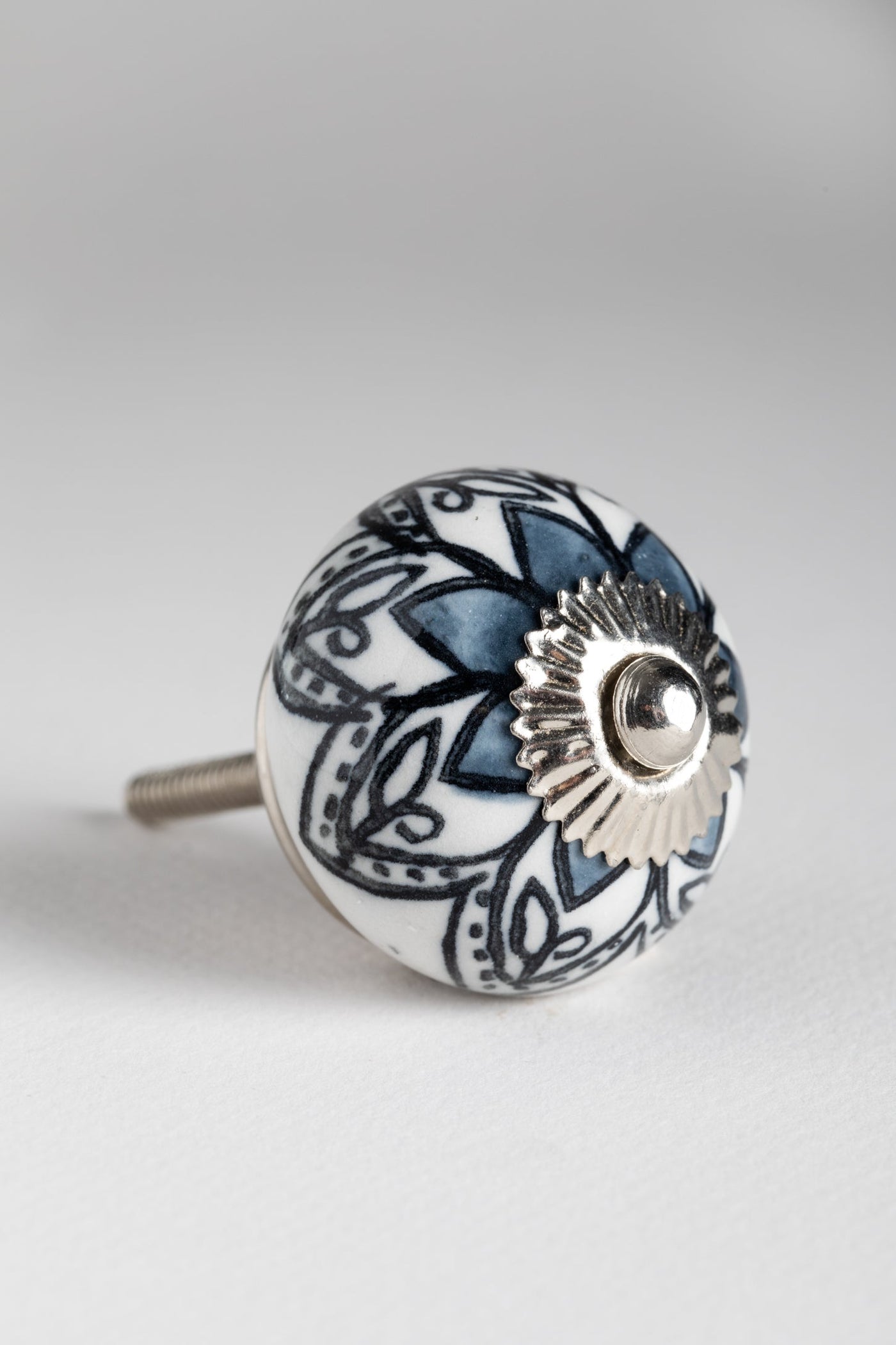 Floral hand painted ceramic knob in black floral
