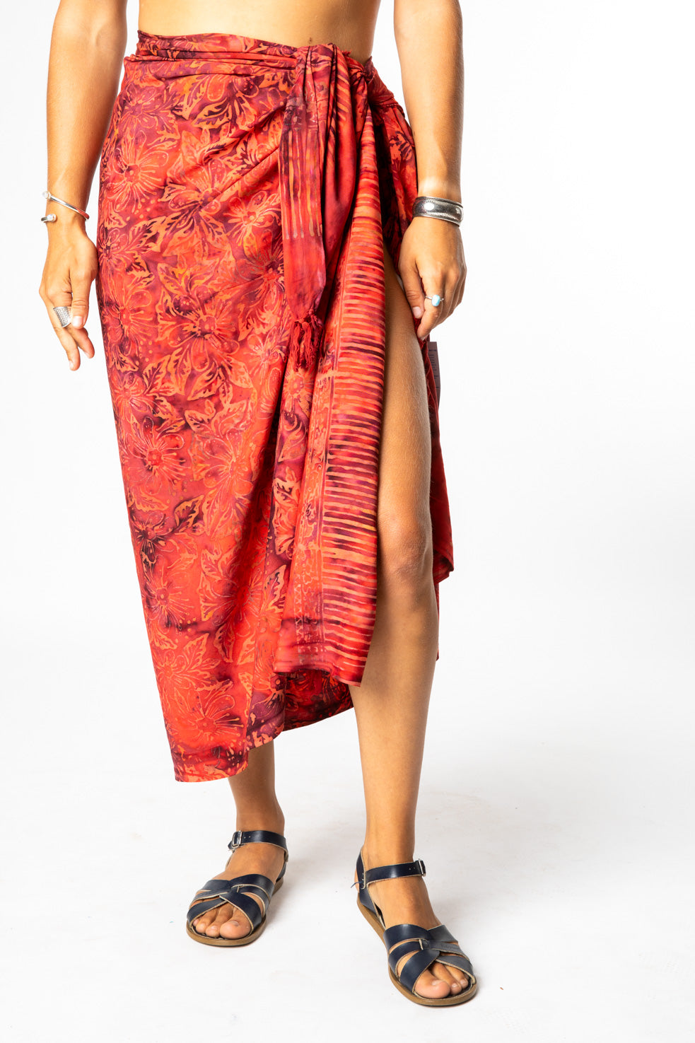 Sophie is wearing a batik sarong in red flower patch