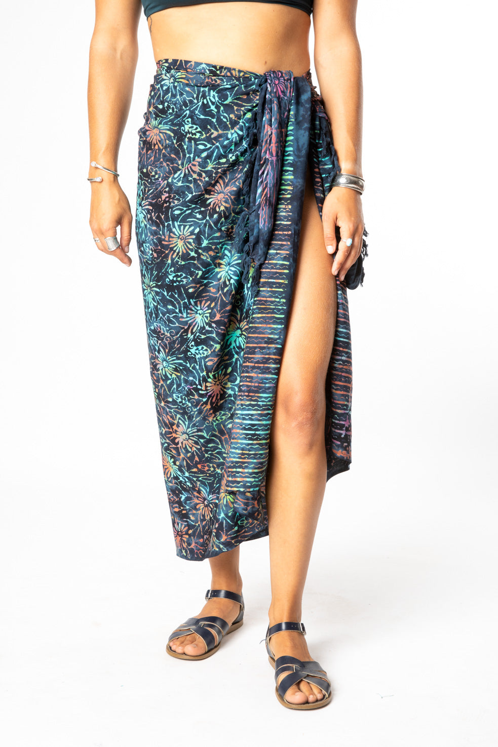 Sophie is wearing a batik sarong in tripping daisies