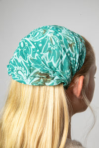 Talia wearing a Green batik one of a kind headband