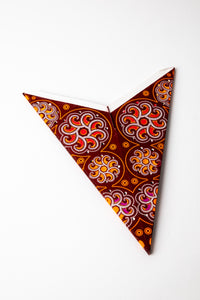 Cyclone Brown embroidered paper star folded up, out of the package