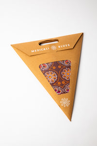 Cyclone Brown embroidered paper star, folded up, in packaging