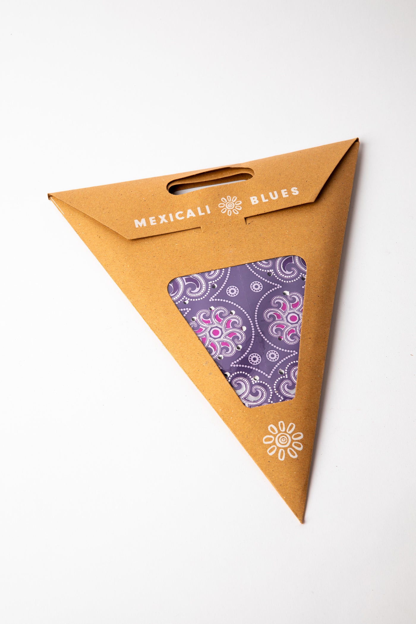 Cyclone Purple embroidered paper star, folded up, in packaging