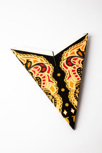 Ganesh Black Glitter embroidered paper star folded up, out of the package