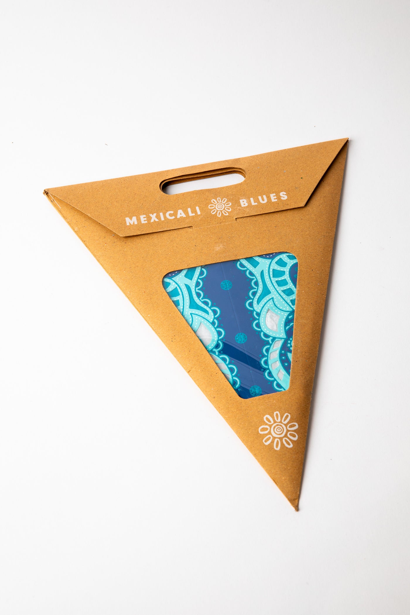 Ganesh Midnight embroidered paper star, folded up, in packaging