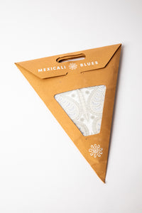 Ganesh White embroidered paper star, folded up, in packaging