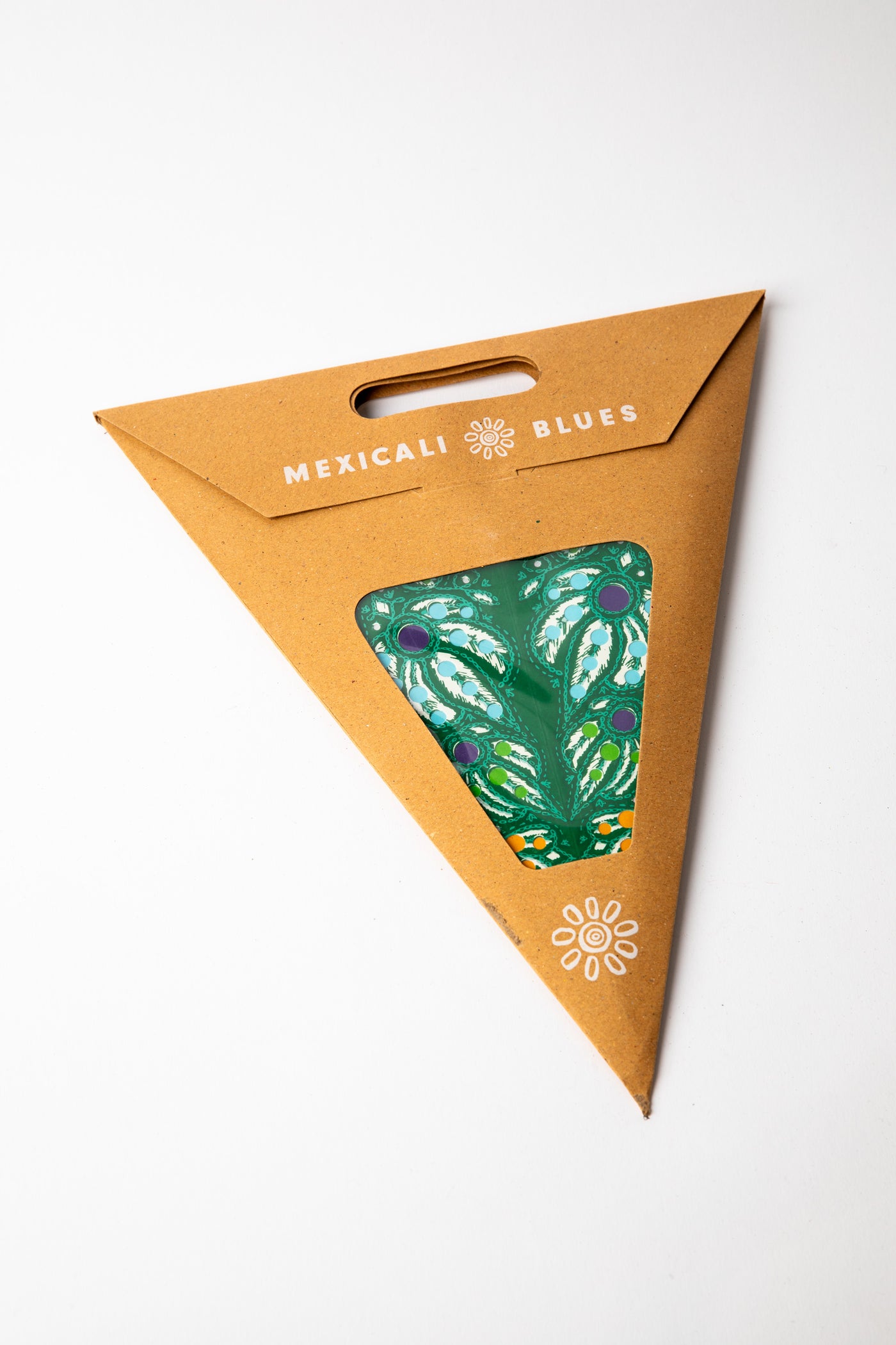 Mari Green embroidered paper star, folded up, in packaging
