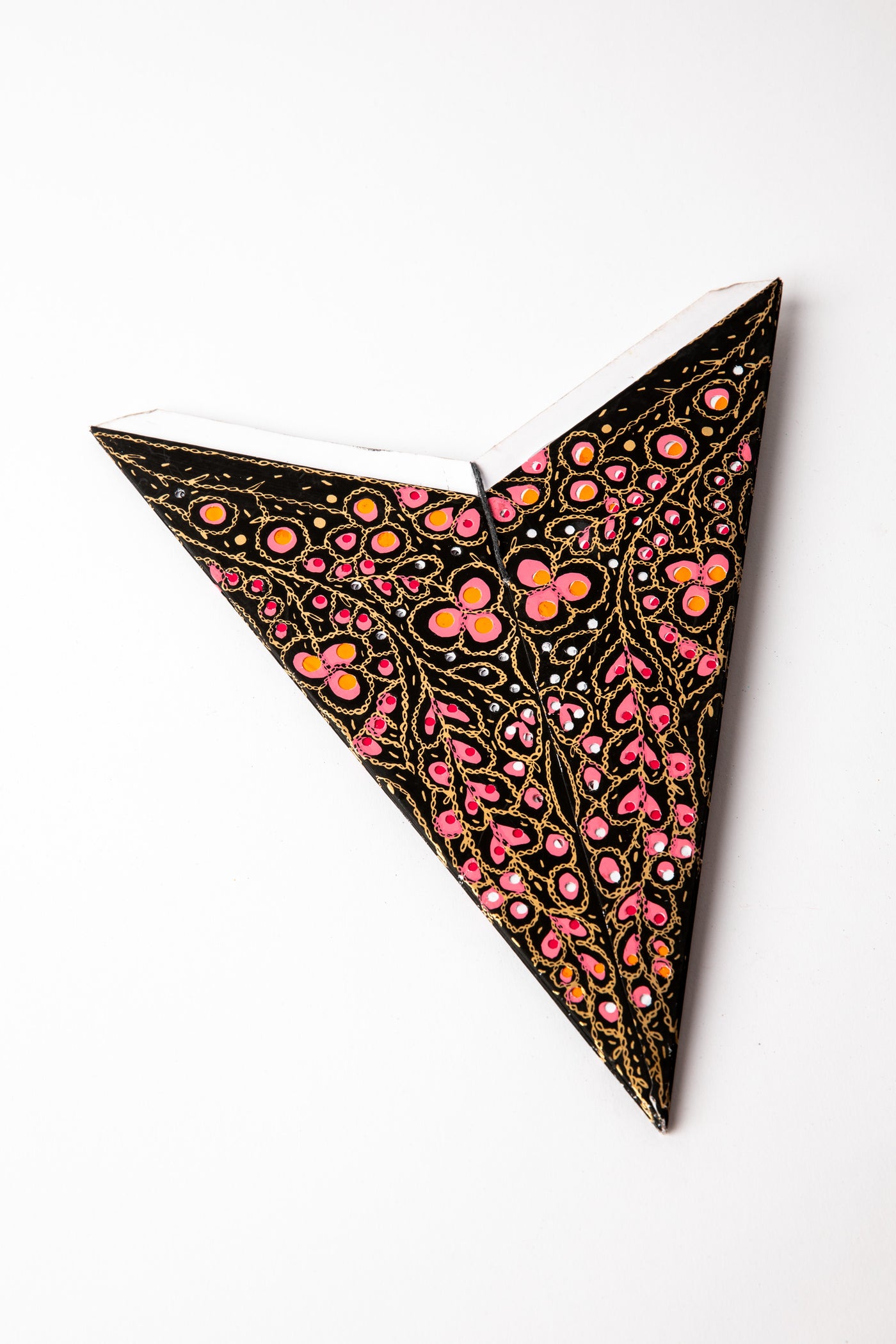 Peacock Garden Black embroidered paper star folded up, out of the package