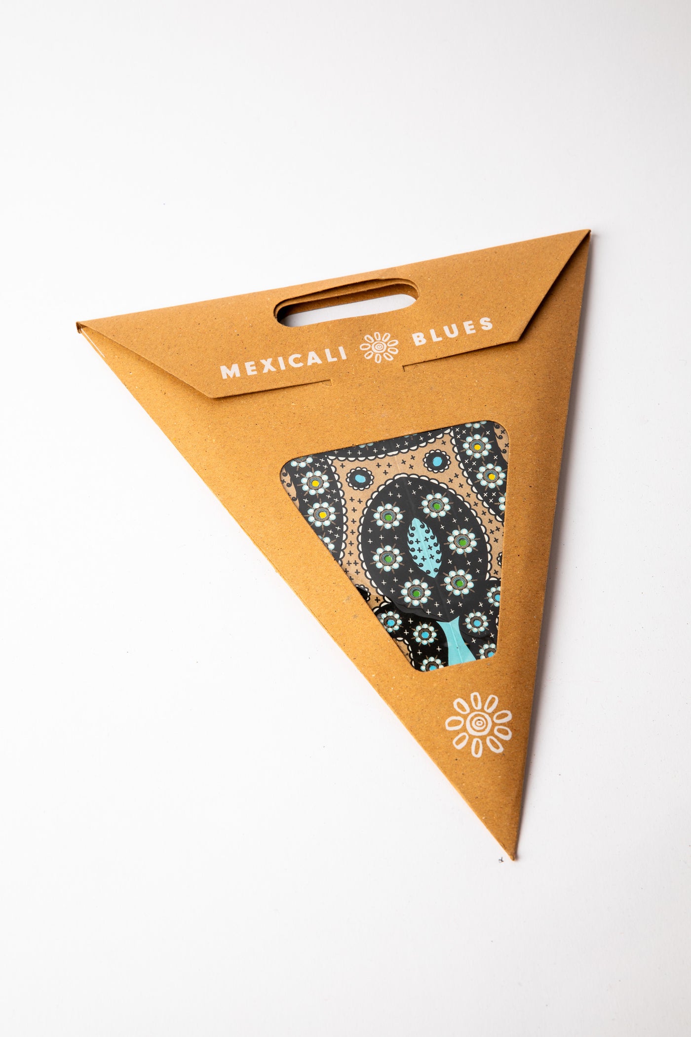 Rajasthani Black Gold embroidered paper star, folded up, in packaging