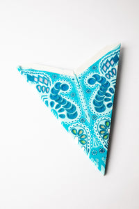Turquoise Zari embroidered paper star folded up, out of the package